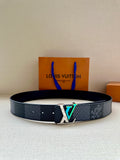 Louis Vuitton belt in dark blue textured leather with silver LV-style buckle