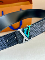 Dark blue Louis Vuitton belt with silver-tone buckle and embossed pattern