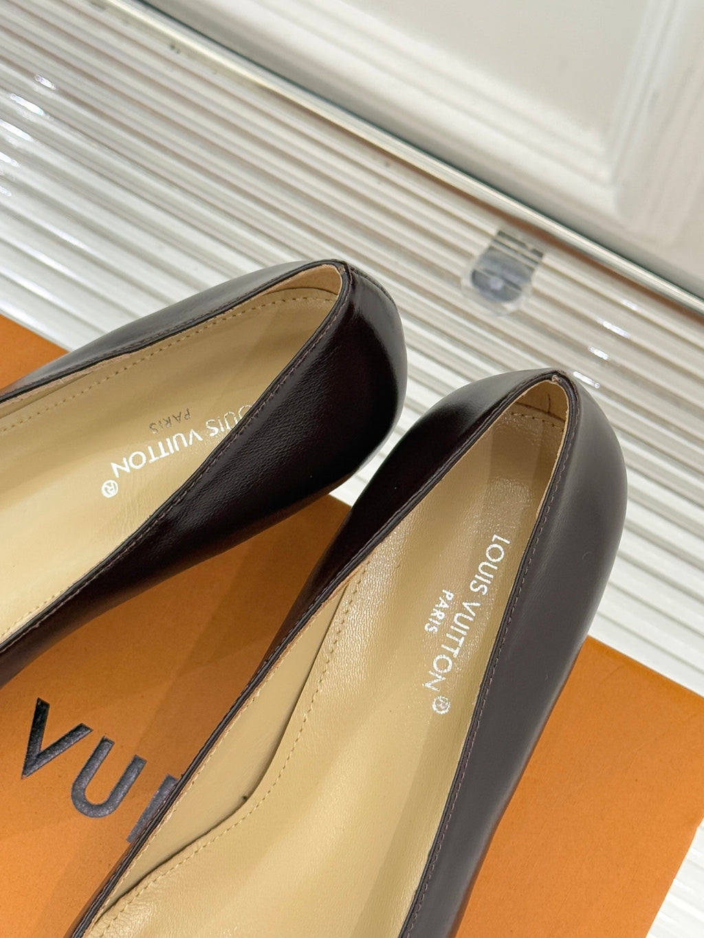 Women's square-toe block-heel pumps in dark brown leather with gold LV logo ornament