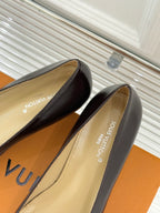 Women's square-toe block-heel pumps in dark brown leather with gold LV logo ornament
