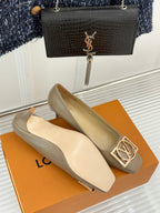 Beige Louis Vuitton ladies pumps with gold LV logo square buckle and low heel