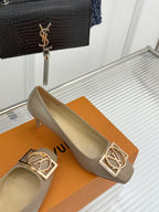 Beige Louis Vuitton ladies pumps with gold LV logo square buckle detail