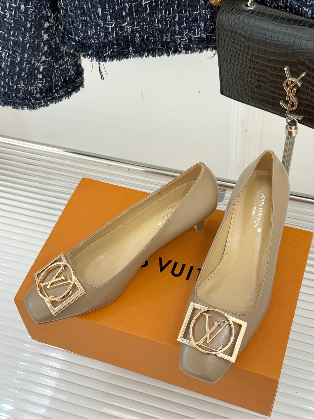 Beige Louis Vuitton ladies low pumps with gold LV logo square buckle