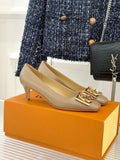 Beige Louis Vuitton ladies square-toe pumps with gold LV logo buckle detail