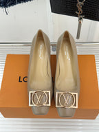 Beige Louis Vuitton ladies sling-back pumps with gold LV logo buckle on toe