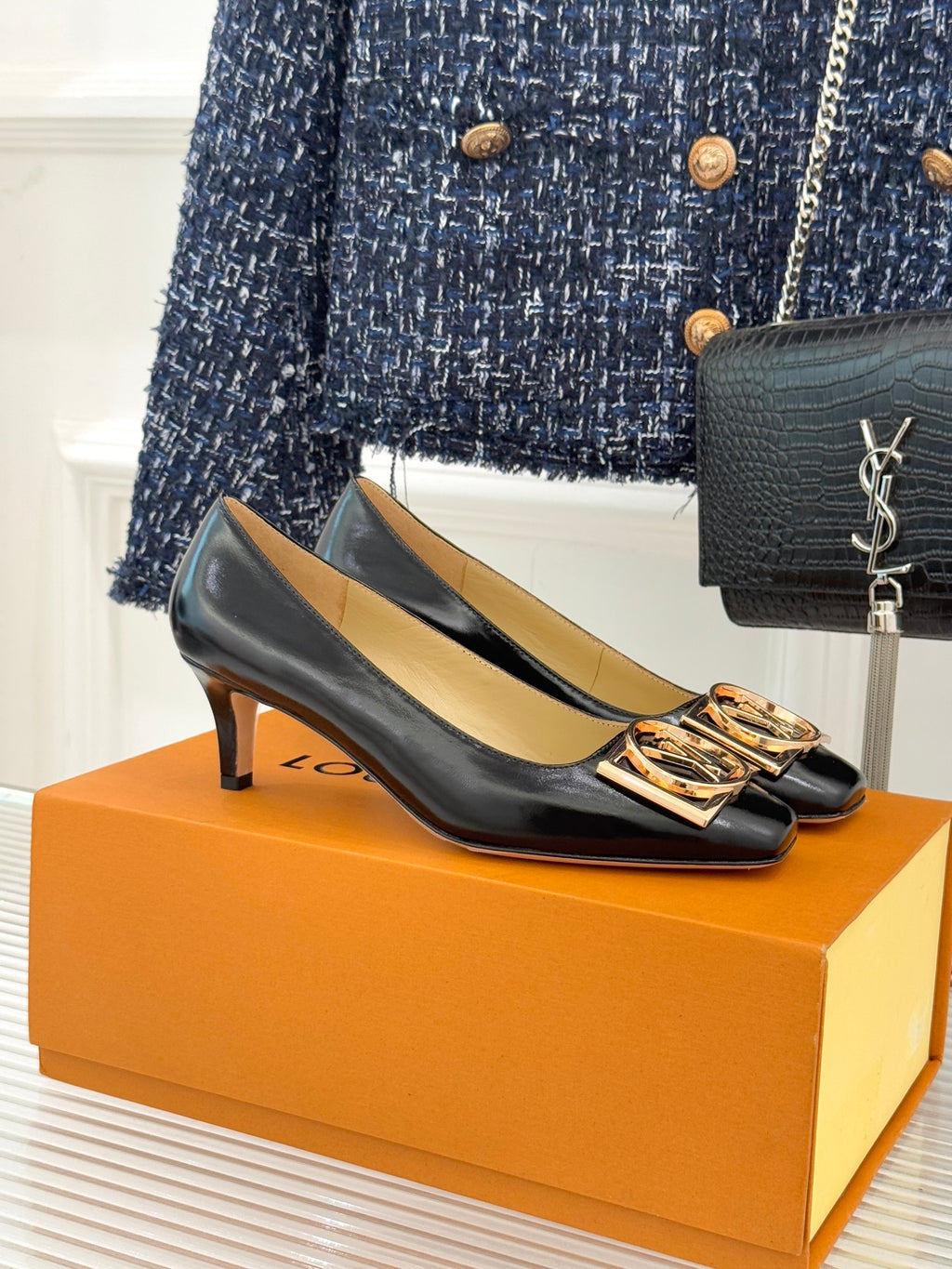 Louis Vuitton ladies black leather flats with square gold logo buckle