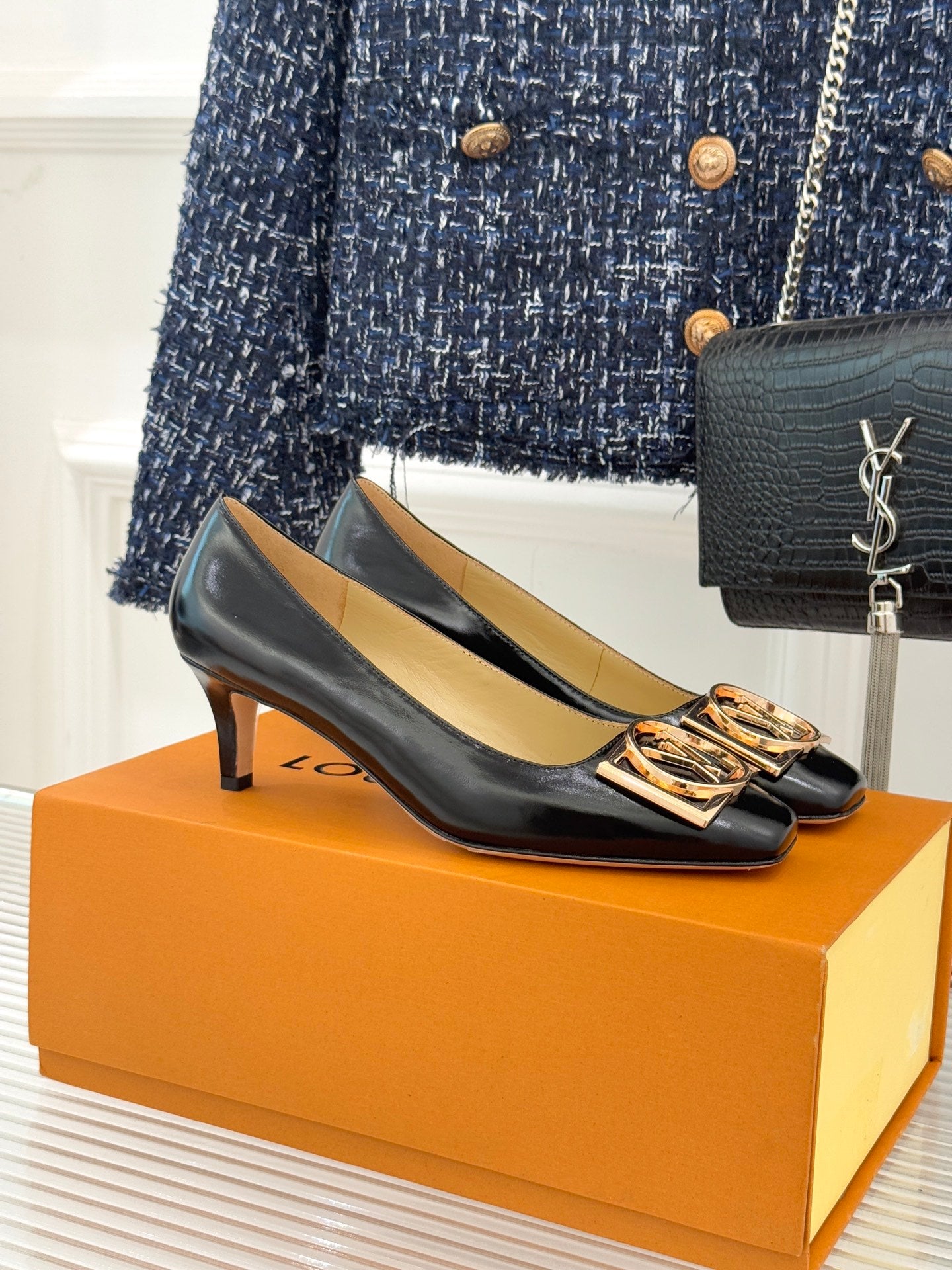 Louis Vuitton ladies black leather flats with square gold logo buckle