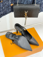 Louis Vuitton black pointed-toe heeled pumps, three-quarter view