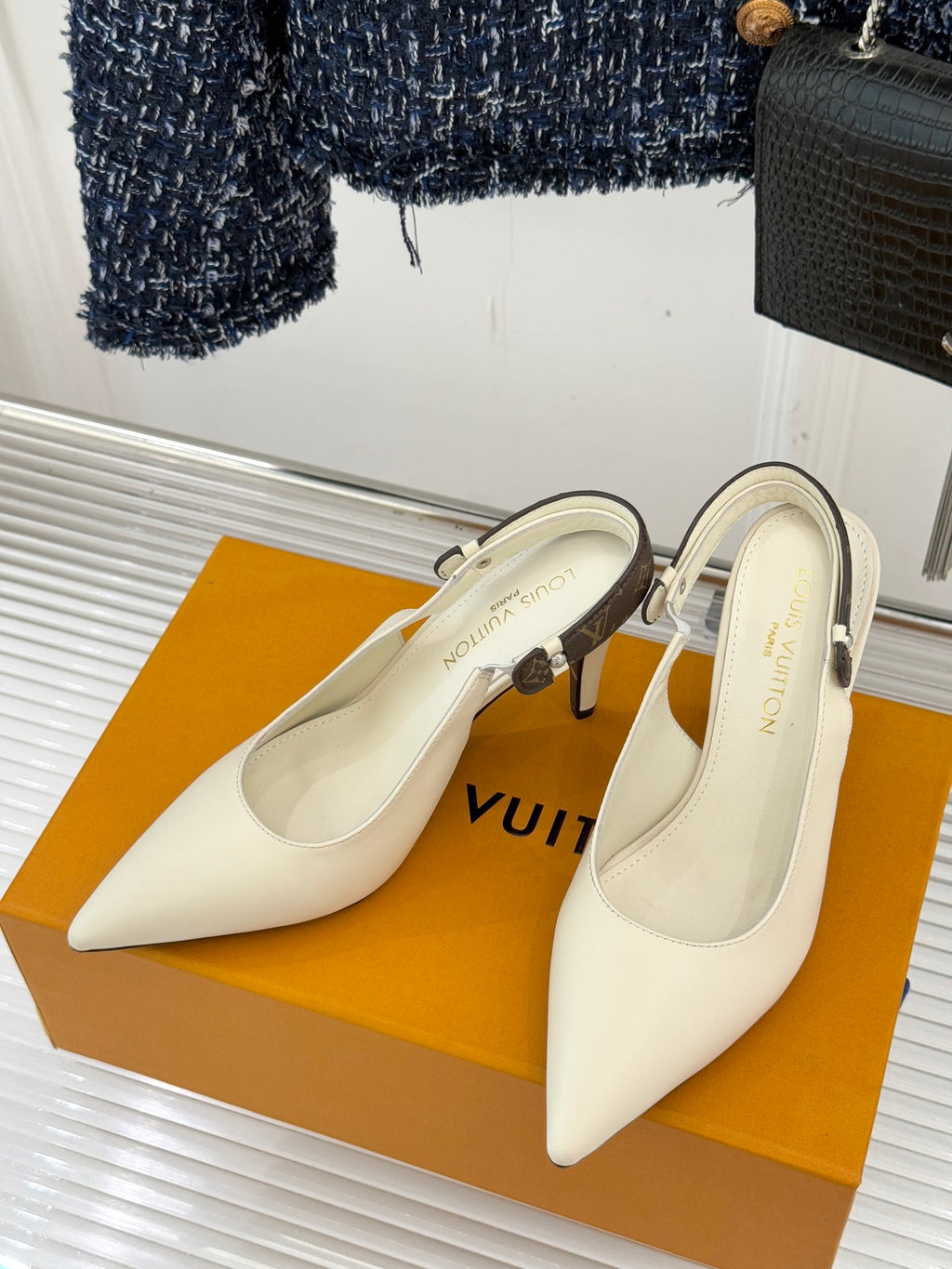 Louis Vuitton women's cream pointed-toe high-heel mules with slingback strap