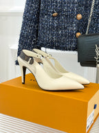 Louis Vuitton women's cream pointed-toe high-heel mule with logo ornament on strap