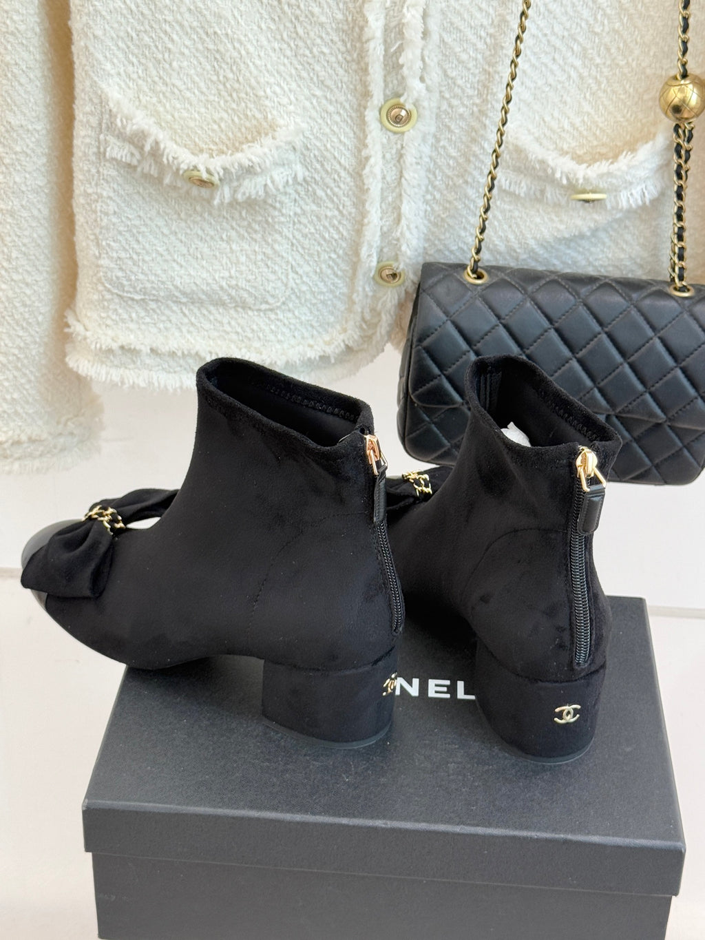 Chanel ladies suede ankle boots with side bow and zipper, block heel, dark suede.