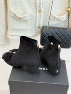 Chanel ladies suede ankle boots with side bow and zipper, block heel, dark suede.