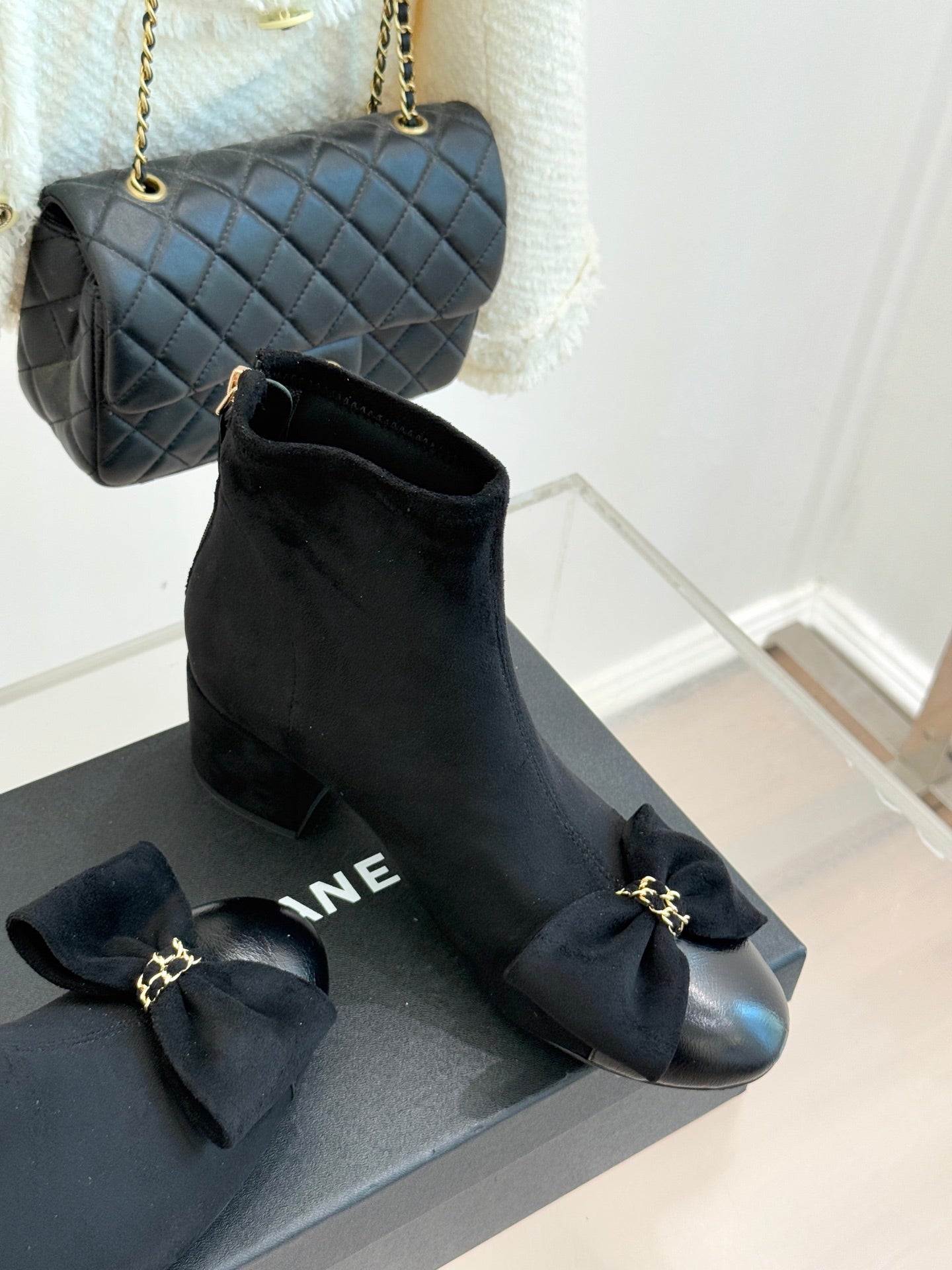 Chanel ladies ankle boots with bow detail and mid block heel, dark suede.