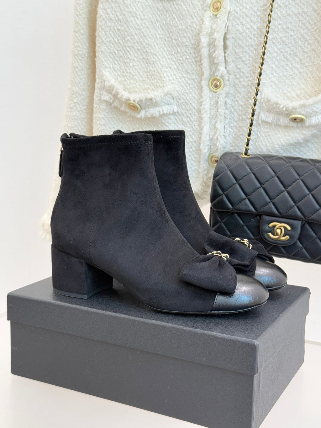 Chanel ladies suede ankle boots with bow detail and block heel, dark blue.