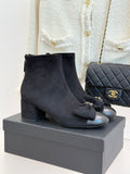 Chanel ladies suede ankle boots with bow detail and block heel, dark blue.