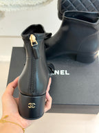 Chanel dark navy leather ankle boots with back ankle zipper and gold-tone hardware