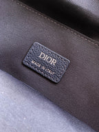 Men's Dior backpack interior label reading DIOR and MADE IN ITALY