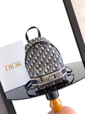 Men’s Dior backpack in blue/cream monogram canvas with black top handle