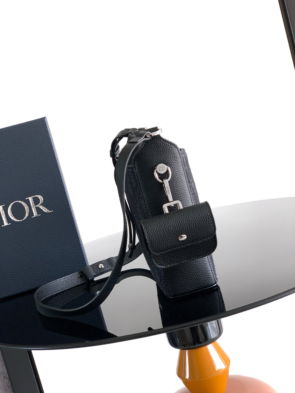 Men's Dior crossbody bag, dark textured leather with front flap and adjustable strap