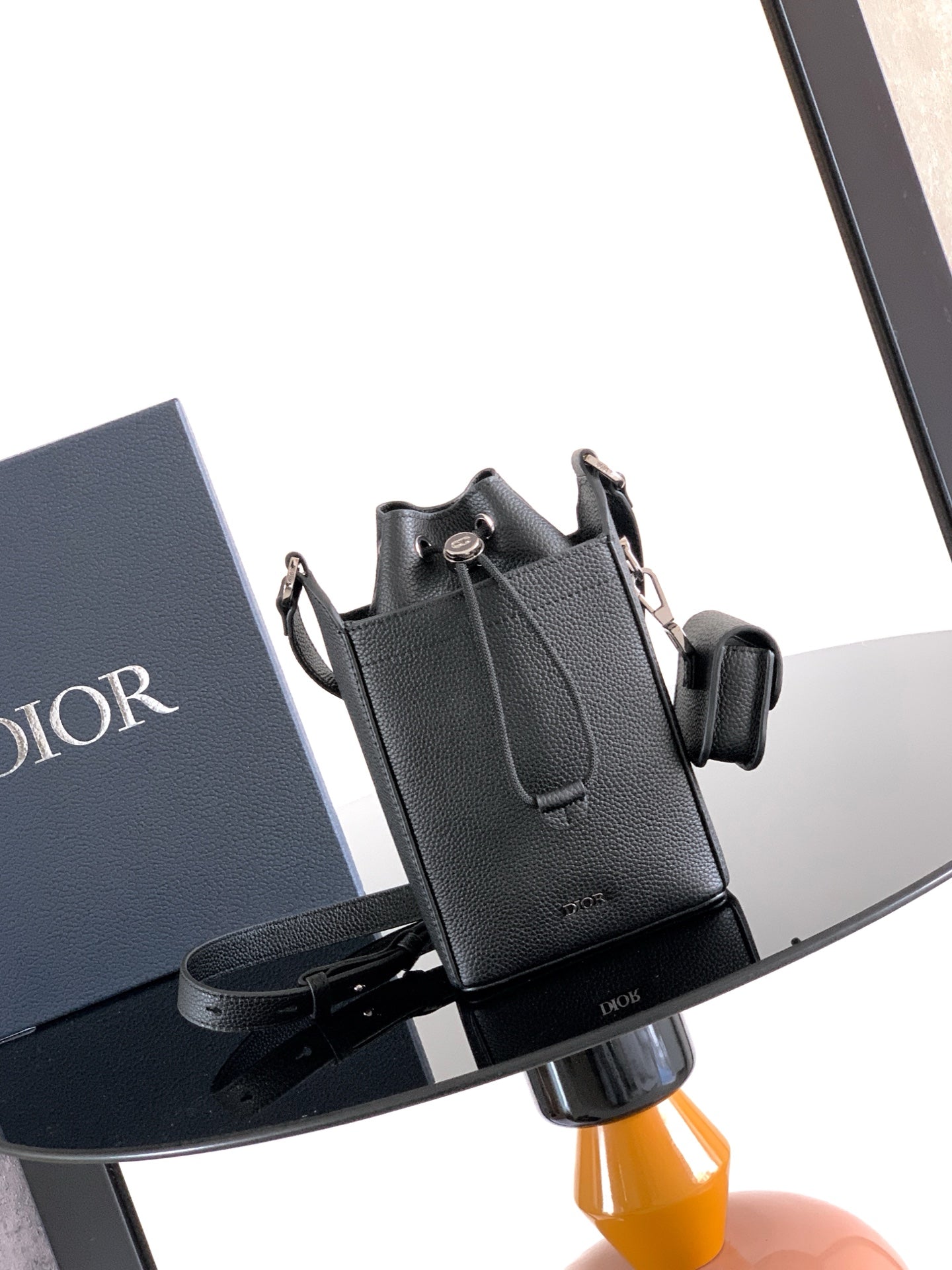 Dior black leather mini bag, top handle, zip closure, adjustable shoulder strap