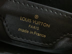 Black leather interior label with gold text: LOUIS VUITTON PARIS made in France