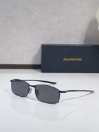 Balenciaga sunglasses with dark frame and gray rectangular lenses