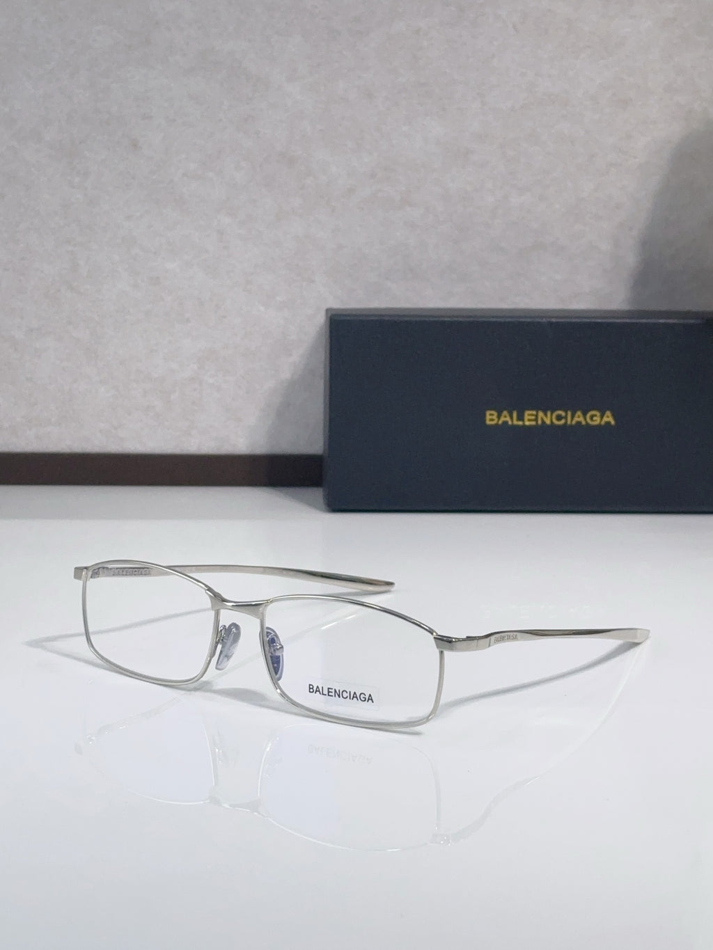 Balenciaga eyeglasses with silver-tone frame and clear lenses
