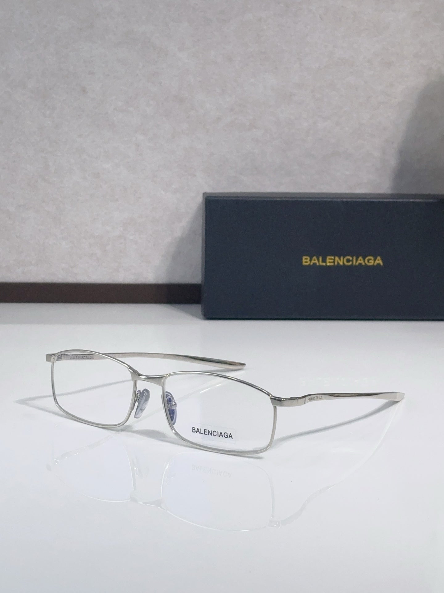Balenciaga eyeglasses with silver-tone frame and clear lenses