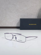 Balenciaga eyeglasses with purple-tone frame and clear lenses