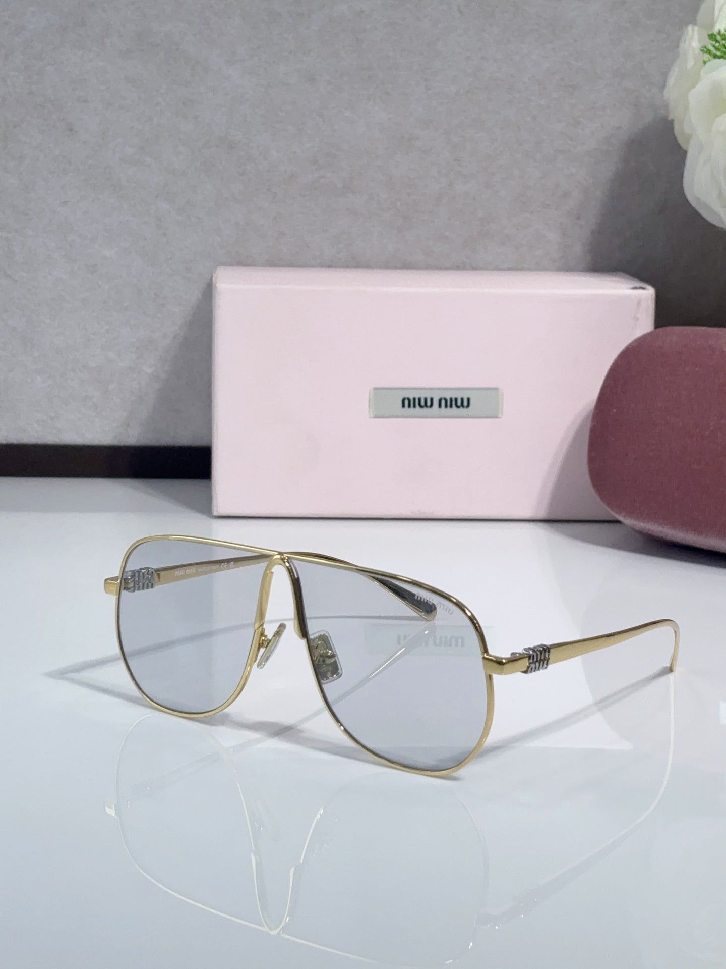 MiuMiu Glasses