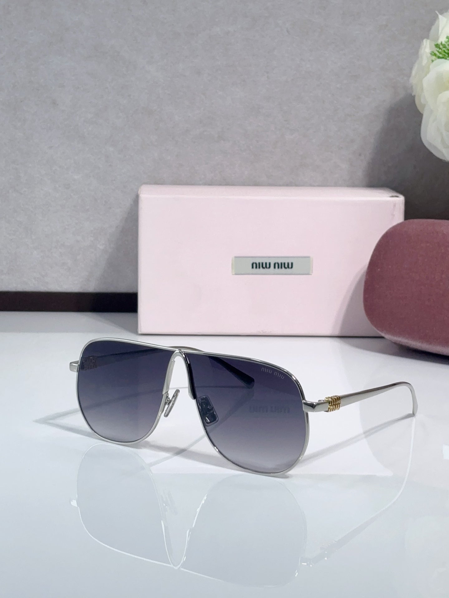 MiuMiu Glasses