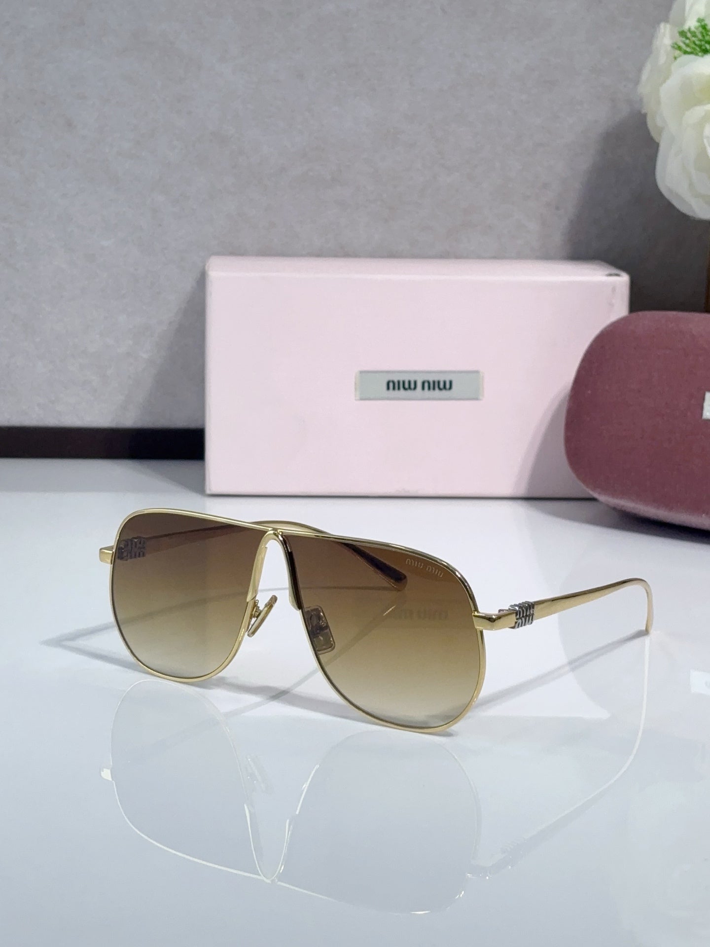MiuMiu Glasses