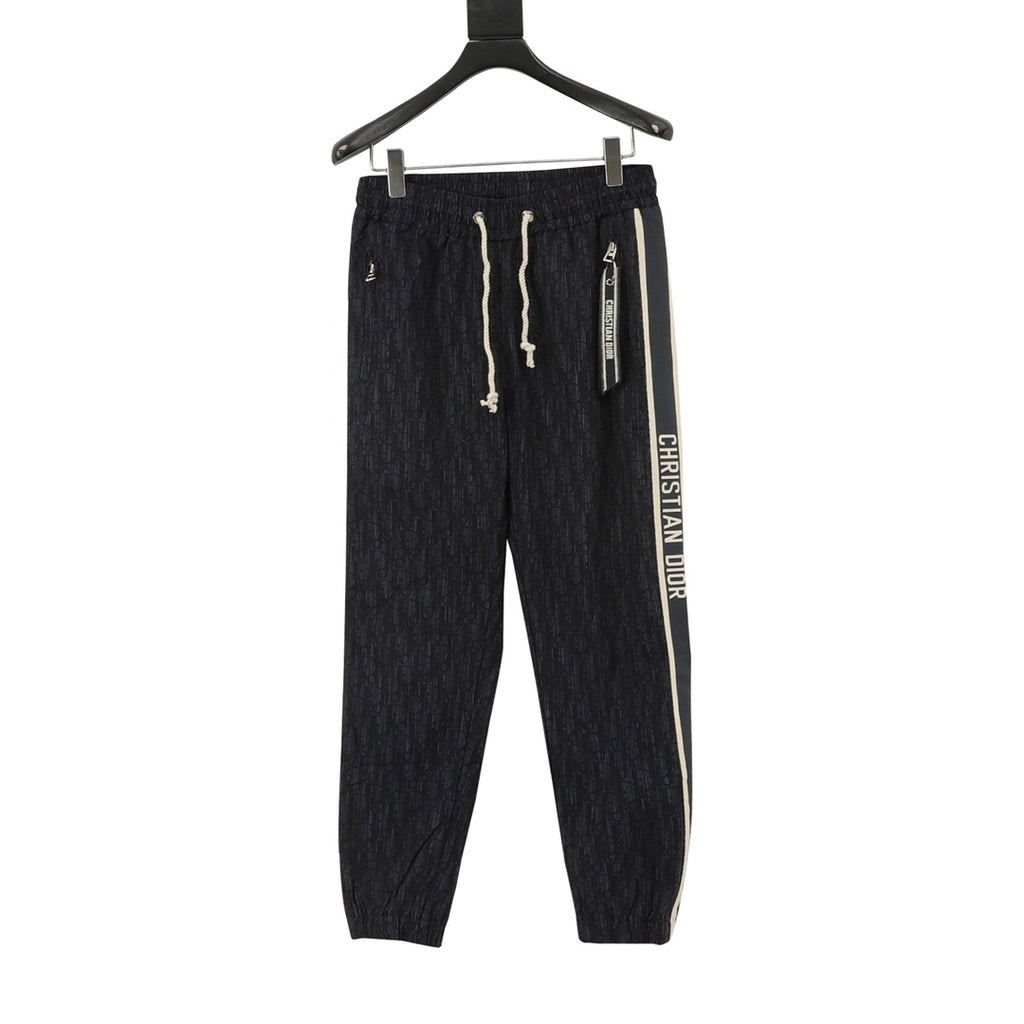Navy jogger pants, elastic waist, white drawstrings, Christian Dior side stripe