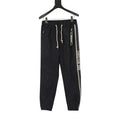 Navy jogger pants, elastic waist, white drawstrings, Christian Dior side stripe
