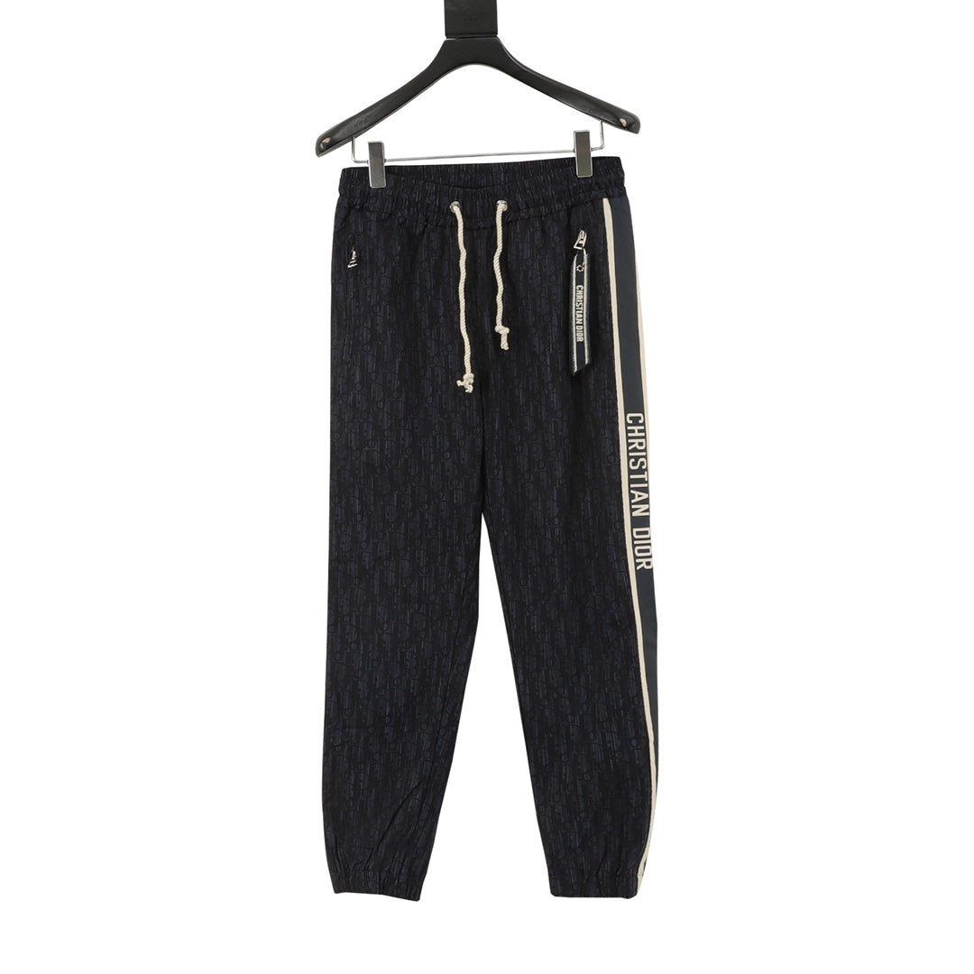 Navy jogger pants, elastic waist, white drawstrings, Christian Dior side stripe