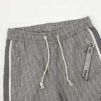 Grey Dior logo pants with drawstring waistband and decorative eyelet pull ties