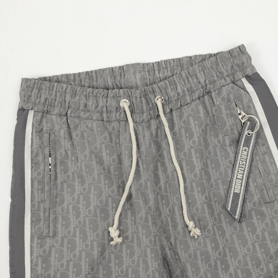 Dior pants in dark gray with drawstring elastic waistband and branded tag