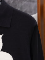 Louis Vuitton long coat shoulder and collar seam, dark fabric, partial logo
