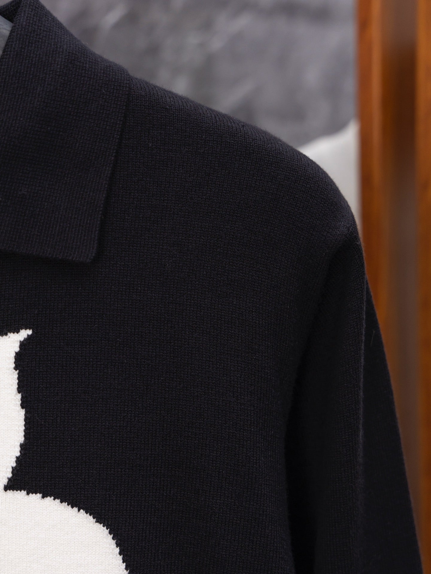 Louis Vuitton long coat shoulder and collar seam, dark fabric, partial logo