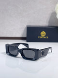 Versace cat-eye sunglasses, dark frame with dark lenses and logo detail on temple
