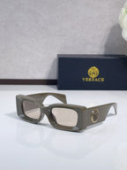 Versace cat-eye sunglasses, olive-gray frame with clear lenses and logo medallion