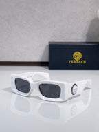 Versace cat-eye sunglasses, white frame with dark lenses and logo medallion