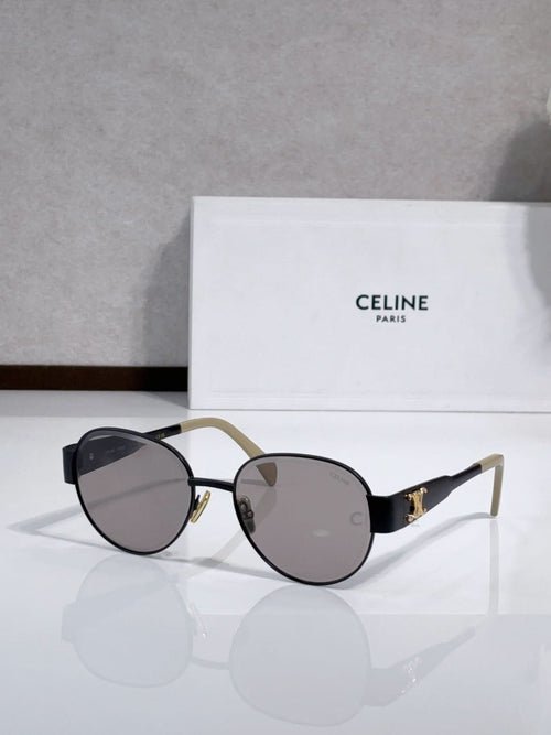 Round sunglasses with black frame, dark lenses, gold-tone details and tortoise arms