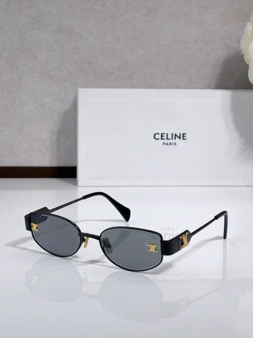 Celine sunglasses with dark blue lenses, black arms, gold-tone frame