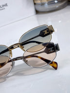 Celine sunglasses close-up with gold-tone frame and blue-tinted lenses