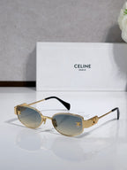 Celine sunglasses with amber lenses, tortoise arms, gold-tone frame