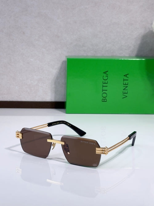 Brown-tinted rectangle glasses with silver frame and tortoise temples