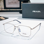 Prada eyeglasses with silver metal frame and clear lenses