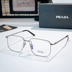 Prada eyeglasses with silver metal frame and clear lenses