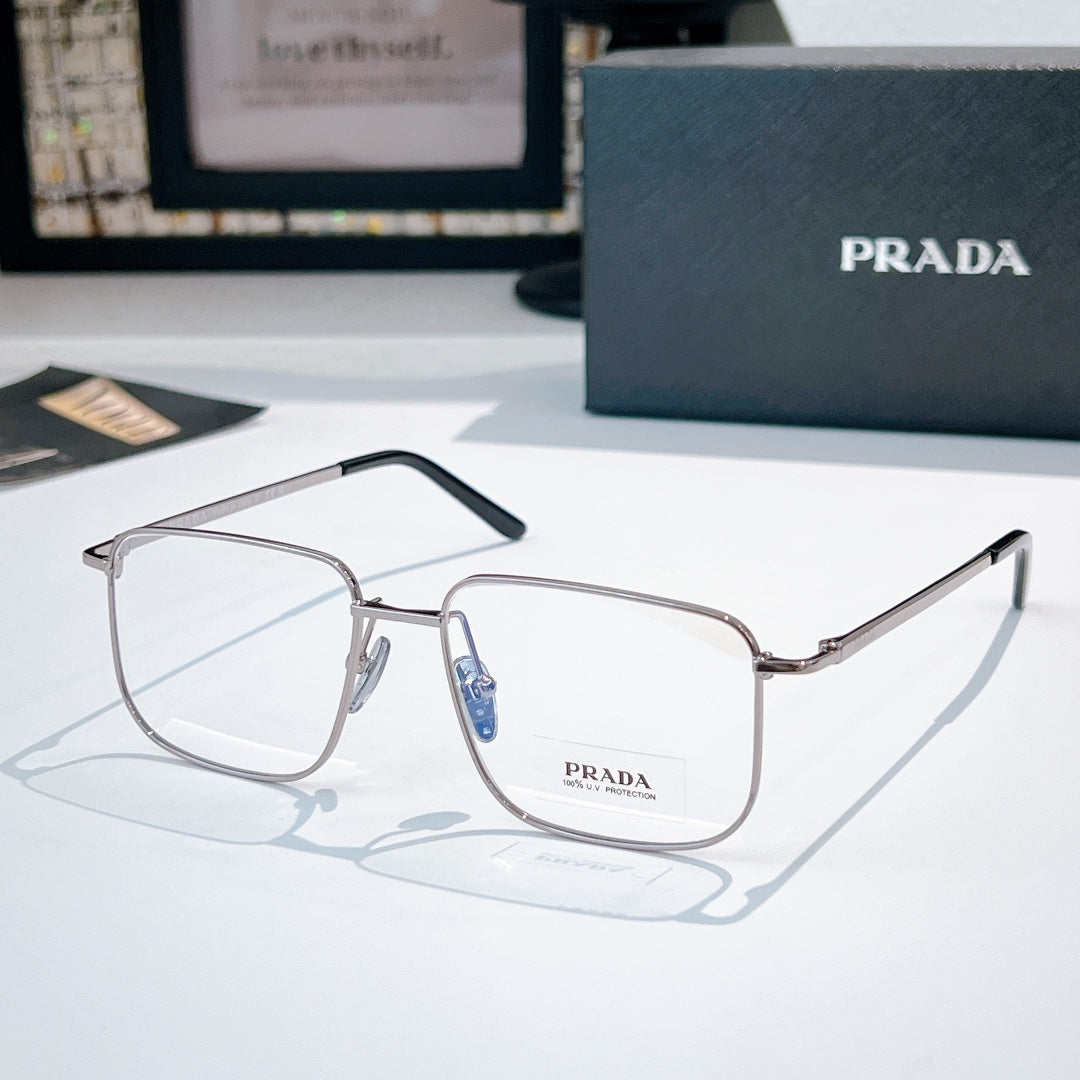Prada eyeglasses with silver metal frame and clear lenses